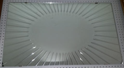 Sun ray v-grooved glass